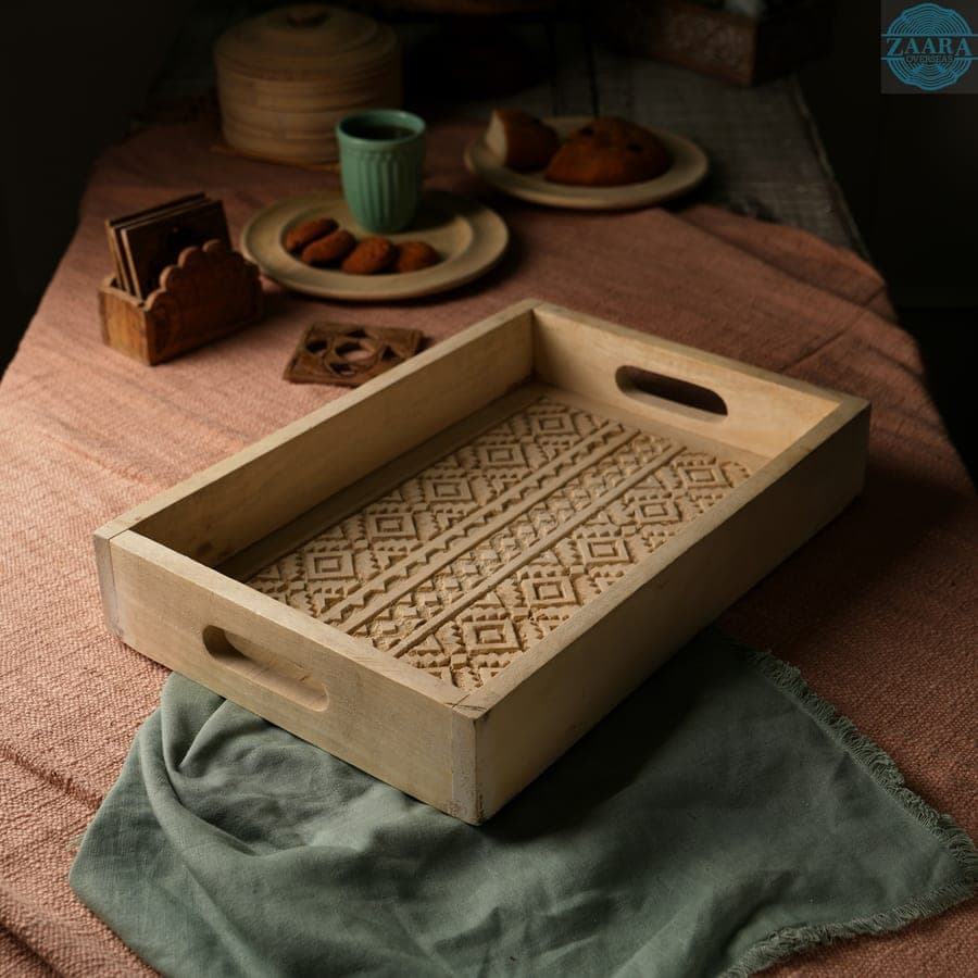 Square nesting tray set holding a styled afternoon spread